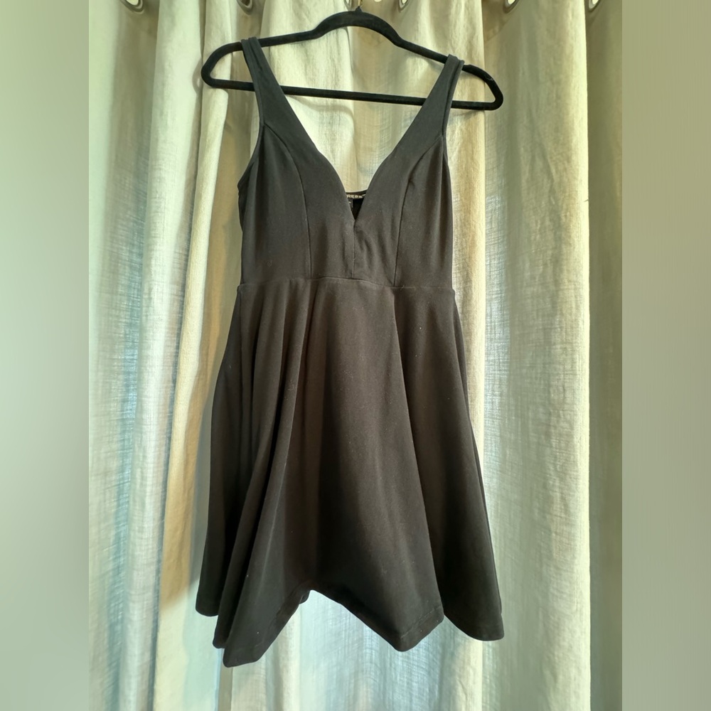 Plunge neck black mini dress